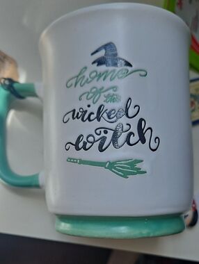 NWT White Ceramic Mug with Mint Handle - 'Home of the Wicked Witch'